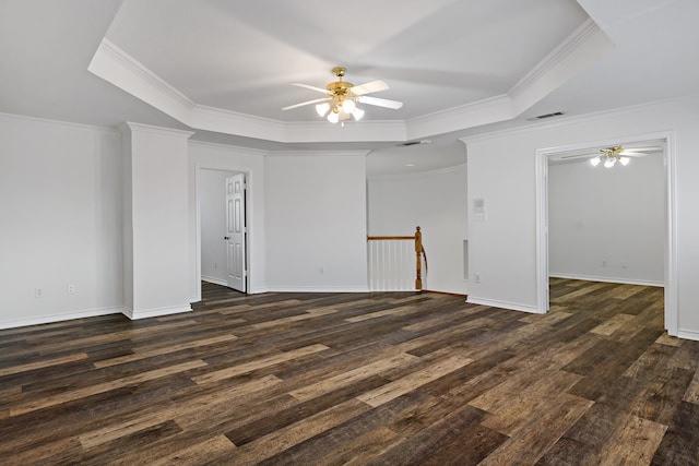 spare room featuring ornamental molding, ceiling fan, and dark hardwood / wood-style flooring