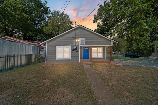 view of front of house featuring a lawn