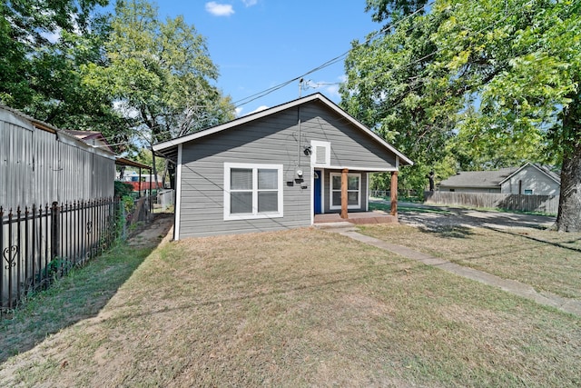 view of front of home with a front yard