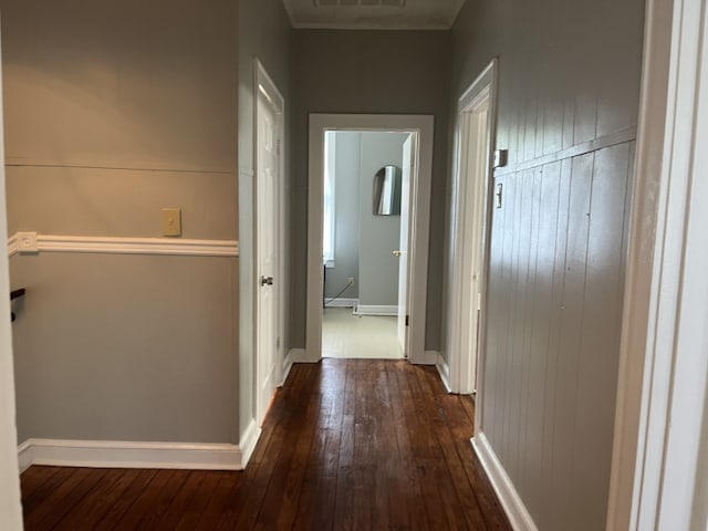 hallway with dark wood-type flooring