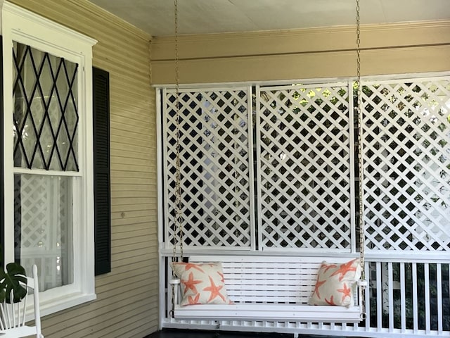 exterior space featuring crown molding