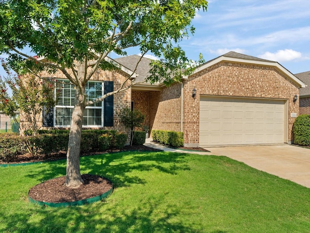 ranch-style house featuring a garage and a front lawn