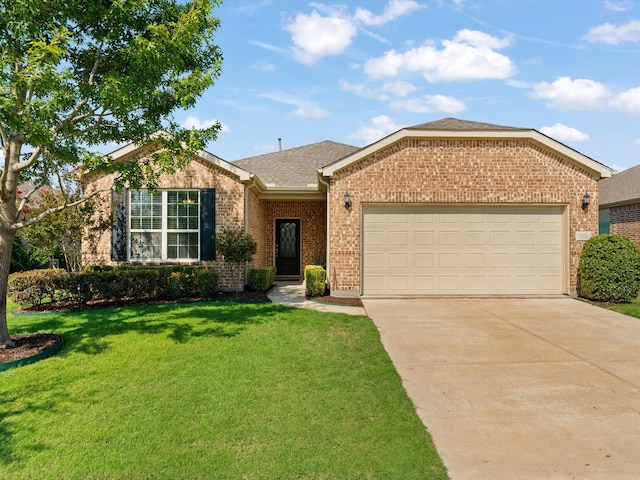 single story home featuring a garage and a front lawn