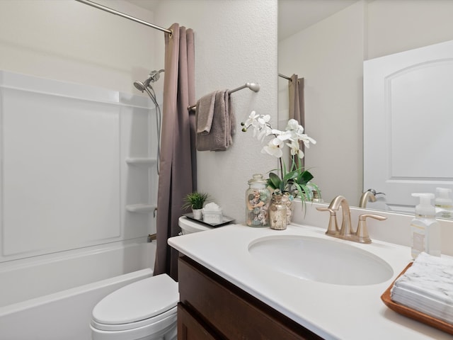 full bathroom featuring vanity, toilet, and shower / bath combo with shower curtain