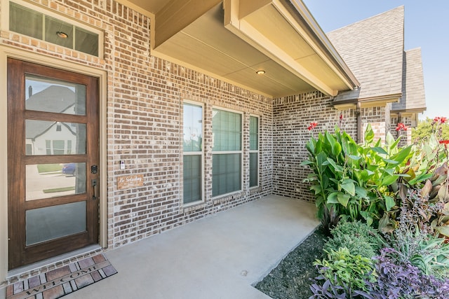 doorway to property featuring a patio