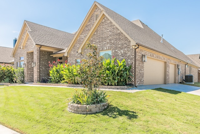 view of home's exterior with cooling unit, a lawn, and a garage