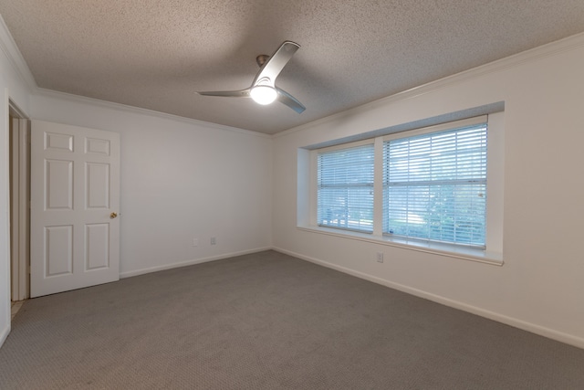 carpeted empty room with ceiling fan, a textured ceiling, and ornamental molding