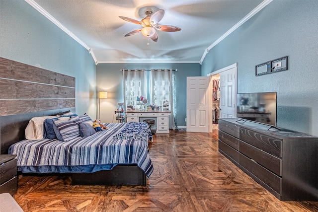 bedroom featuring a textured ceiling, crown molding, dark parquet floors, and ceiling fan