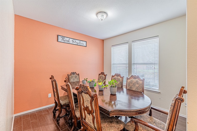 dining space with dark wood-type flooring