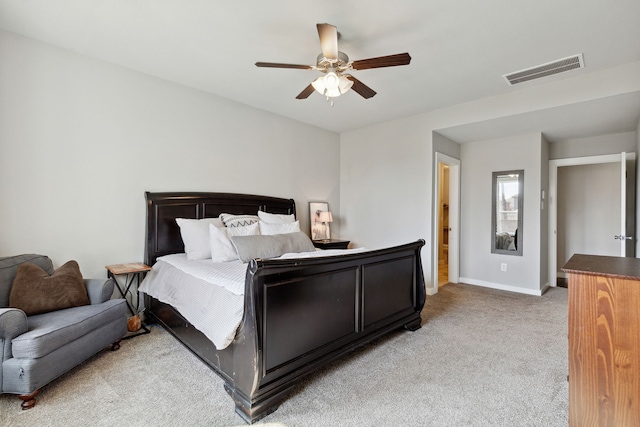 bedroom featuring ceiling fan and light colored carpet