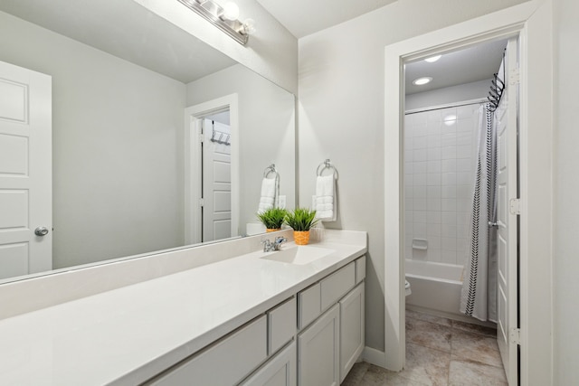 full bathroom with vanity, shower / bath combo with shower curtain, toilet, and tile patterned flooring