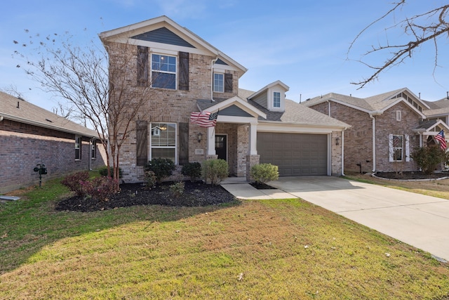 view of front of home with a front yard and a garage