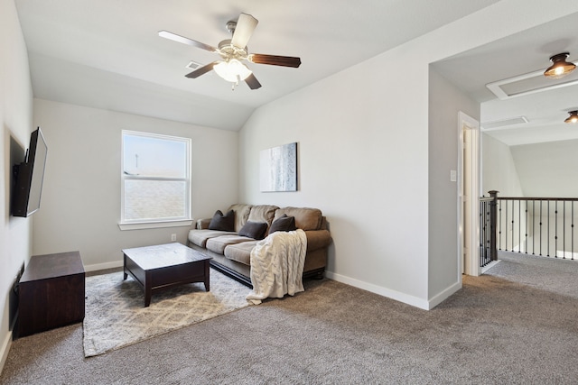 living room with ceiling fan, carpet flooring, and vaulted ceiling