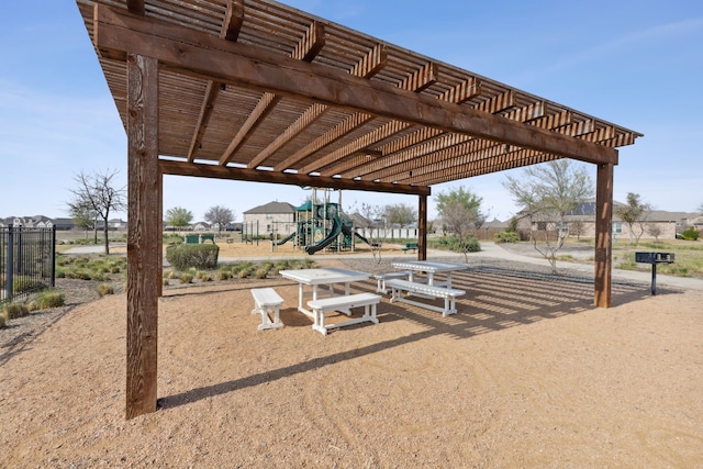 view of property's community with a playground