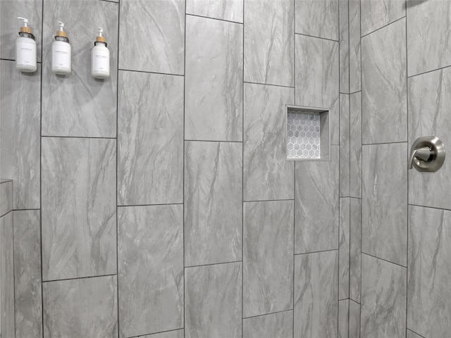 details featuring a tile shower