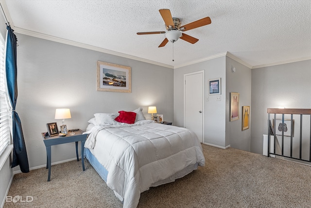 carpeted bedroom with crown molding, a textured ceiling, and ceiling fan