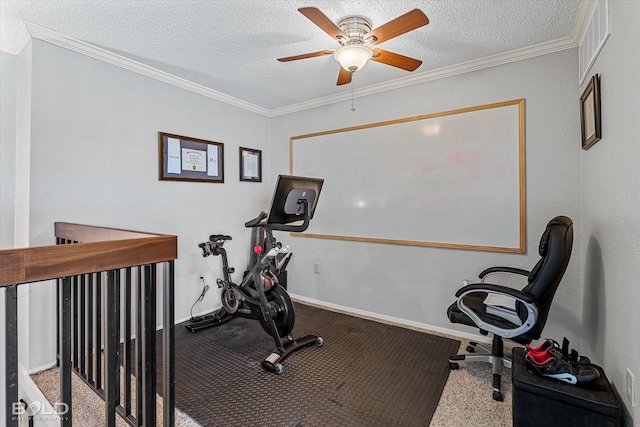 exercise area with carpet floors, a textured ceiling, ornamental molding, and ceiling fan