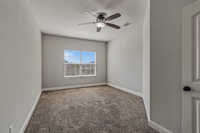 unfurnished room featuring carpet flooring and ceiling fan