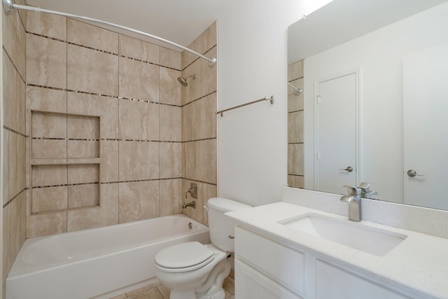 full bathroom with tiled shower / bath combo, tile patterned floors, vanity, and toilet