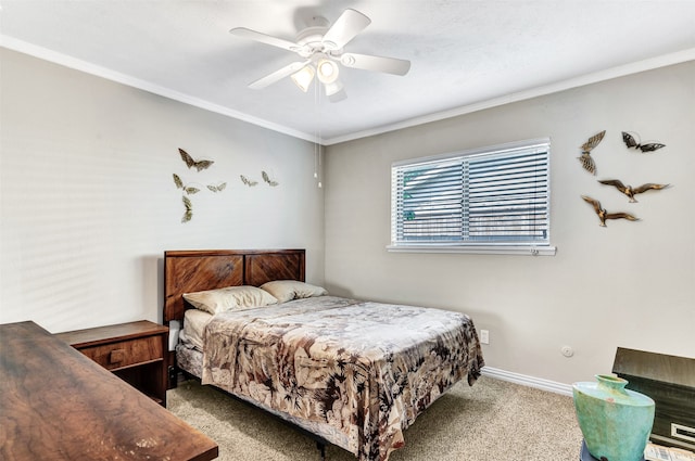 carpeted bedroom featuring crown molding and ceiling fan