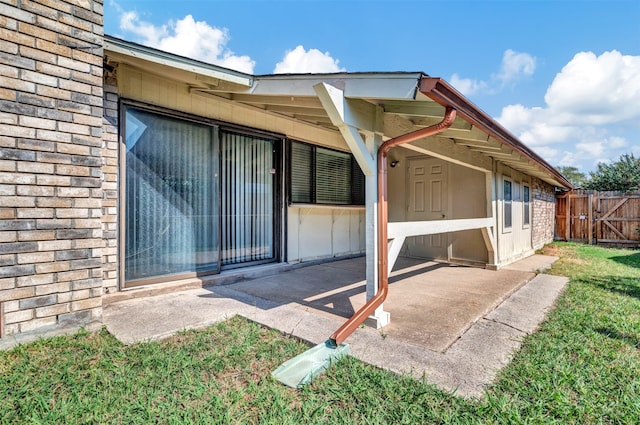 doorway to property featuring a patio area