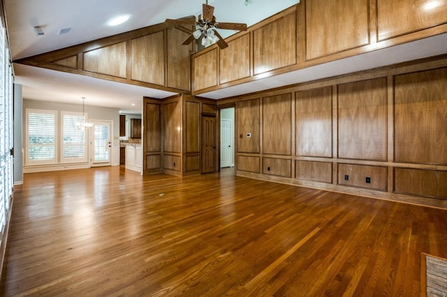 unfurnished living room featuring high vaulted ceiling, ceiling fan, and hardwood / wood-style floors