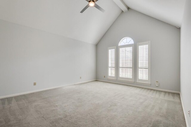 unfurnished living room featuring ceiling fan, dark hardwood / wood-style flooring, high vaulted ceiling, and a fireplace