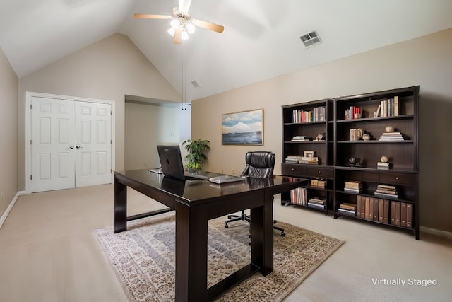 office featuring ceiling fan, carpet, and vaulted ceiling