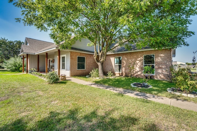 ranch-style house with a front yard