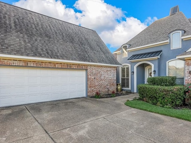 view of front of home featuring a garage