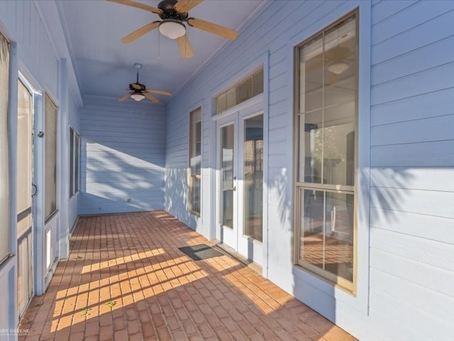 wooden terrace with ceiling fan