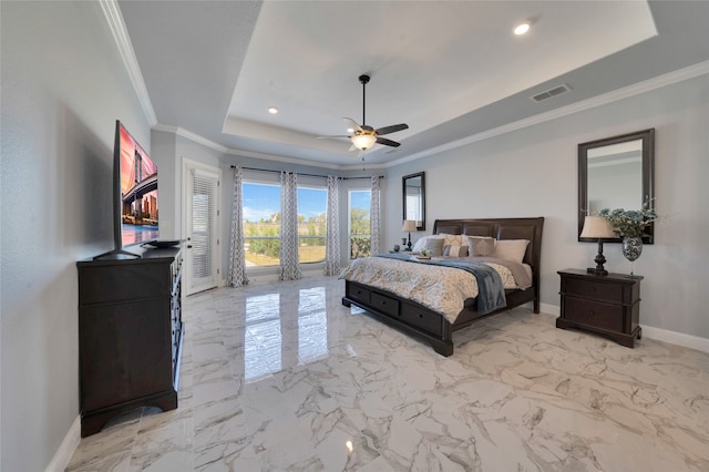 bedroom featuring crown molding, ceiling fan, and a raised ceiling