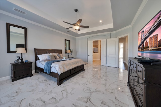 bedroom featuring a raised ceiling, crown molding, and ceiling fan