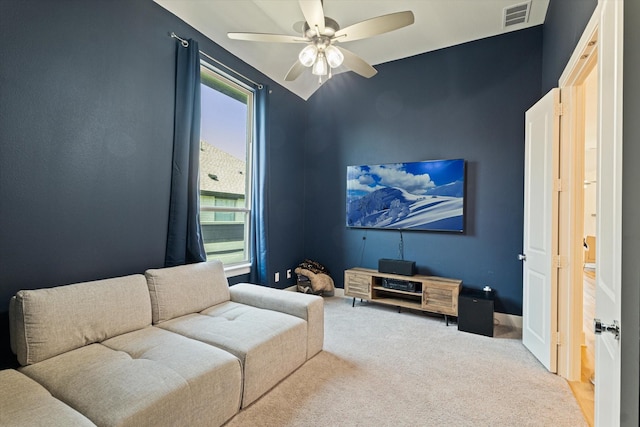 living area with a ceiling fan, carpet, and visible vents