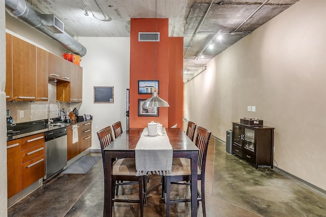 dining space featuring sink