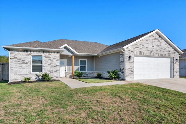 single story home with a front yard and a garage