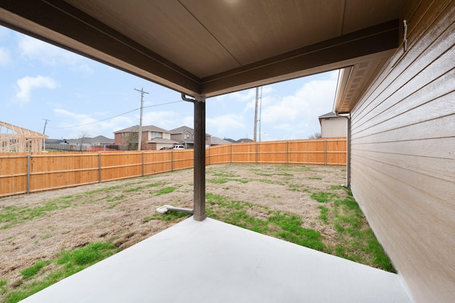 view of yard with a fenced backyard and a patio