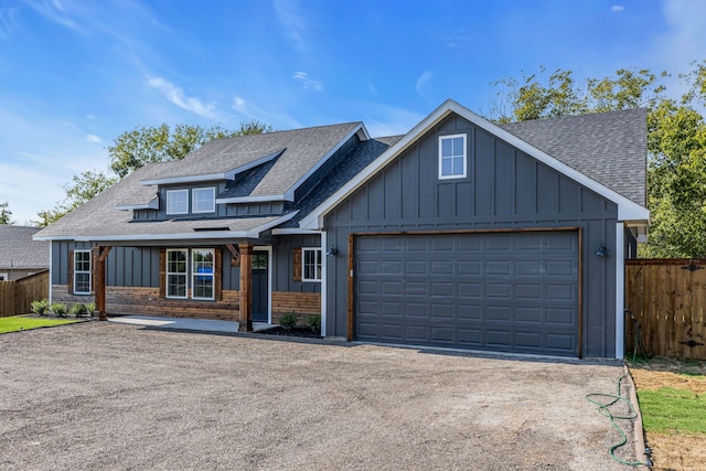 craftsman house with a porch and a garage