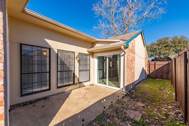 rear view of house with a patio area