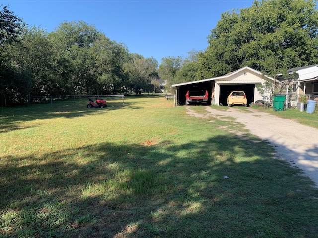 view of yard featuring a carport