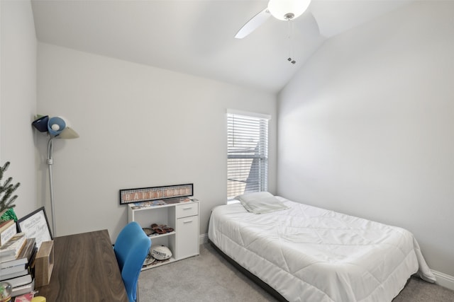 bedroom featuring lofted ceiling, ceiling fan, and light colored carpet