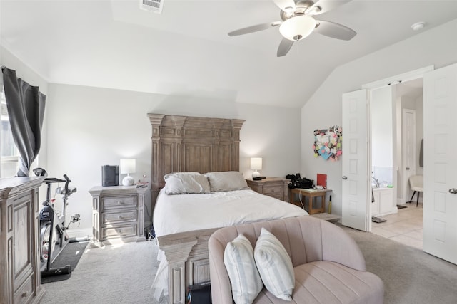 carpeted bedroom featuring lofted ceiling, multiple windows, and ceiling fan