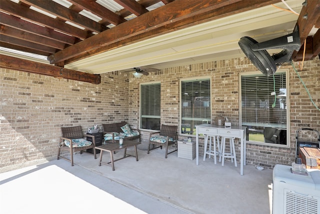 view of patio / terrace with ceiling fan and an outdoor hangout area