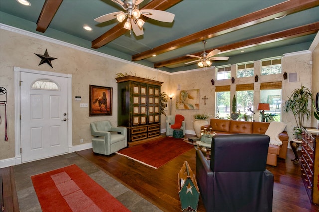 living room featuring ornamental molding, beamed ceiling, ceiling fan, and dark wood-type flooring