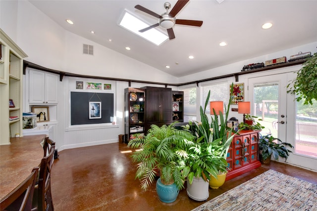 interior space featuring ceiling fan and lofted ceiling