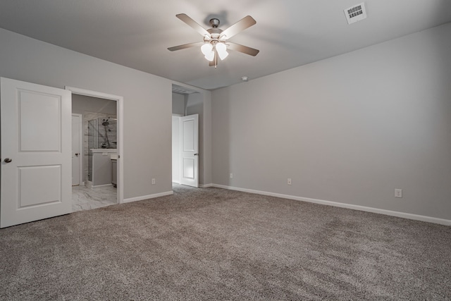 unfurnished bedroom with light carpet, ensuite bath, and ceiling fan