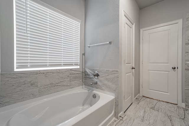 bathroom featuring a tub