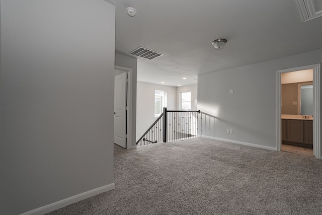 view of carpeted spare room