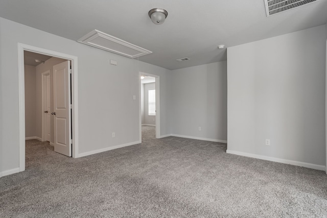 unfurnished room featuring carpet floors