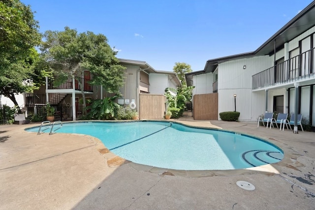 view of pool featuring a patio